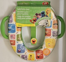 Sesame Street Soft Potty Seat 18m With Easy Grip Handles And Deflector Shield