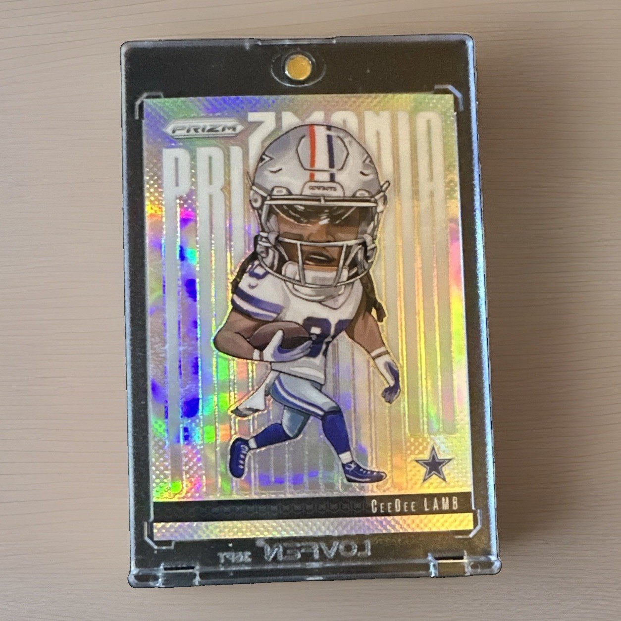 CeeDee Lamb #12 Football Cards 2024 Panini Prizm Prizmania trading card — raw and PSA graded price guide