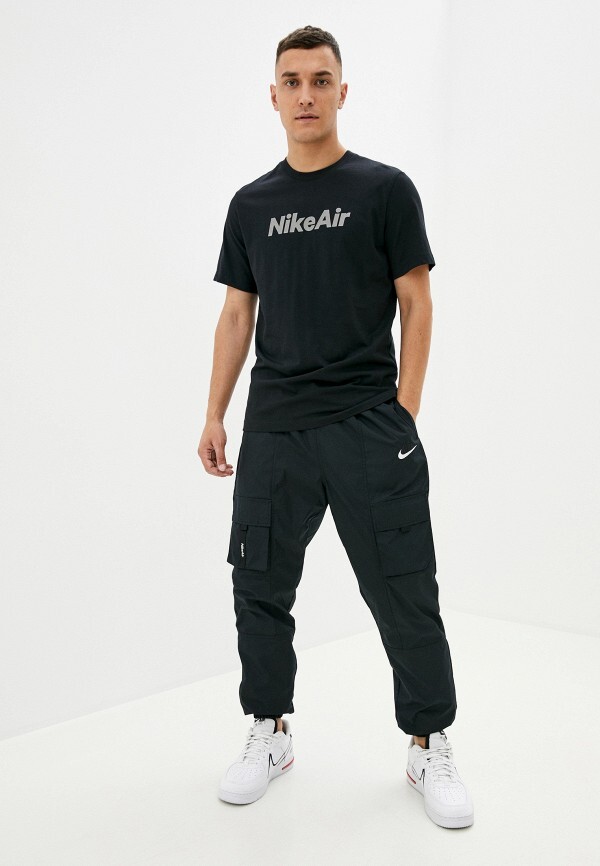 nike woven taping cuffed joggers in black
