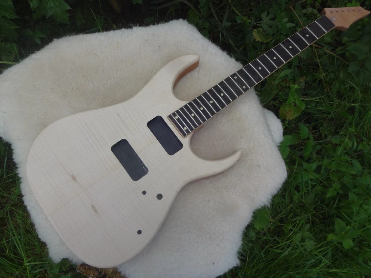 super strat style guitar body with fitted neck and backplate routed for p90