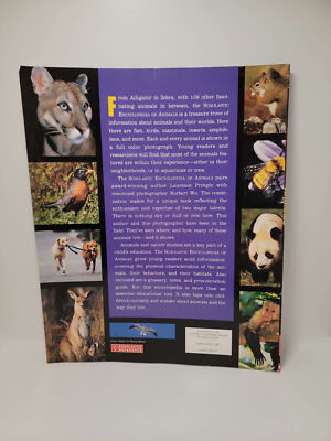 Scholastic Encyclopedia of Animals by Laurence Pringle photos by