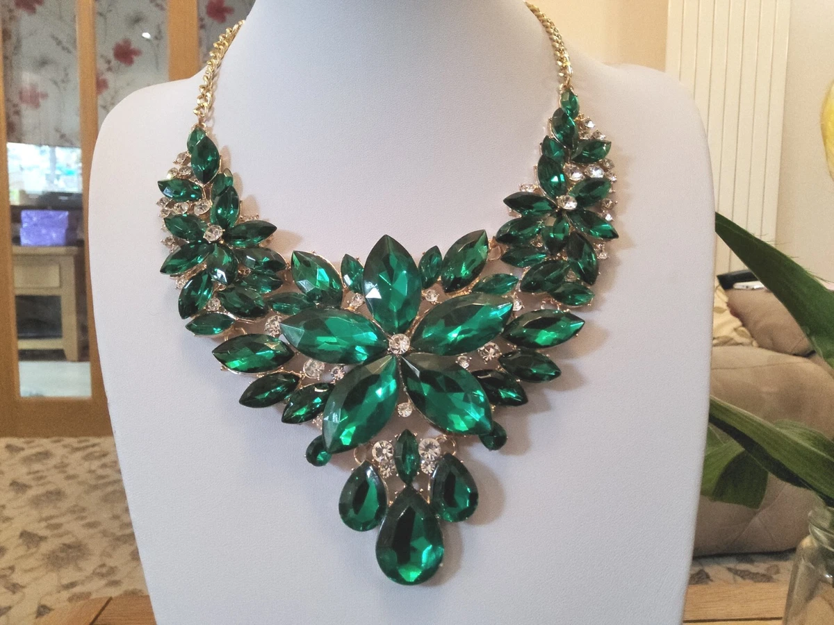 Brand new large gold tone statement necklace with emerald green crystals