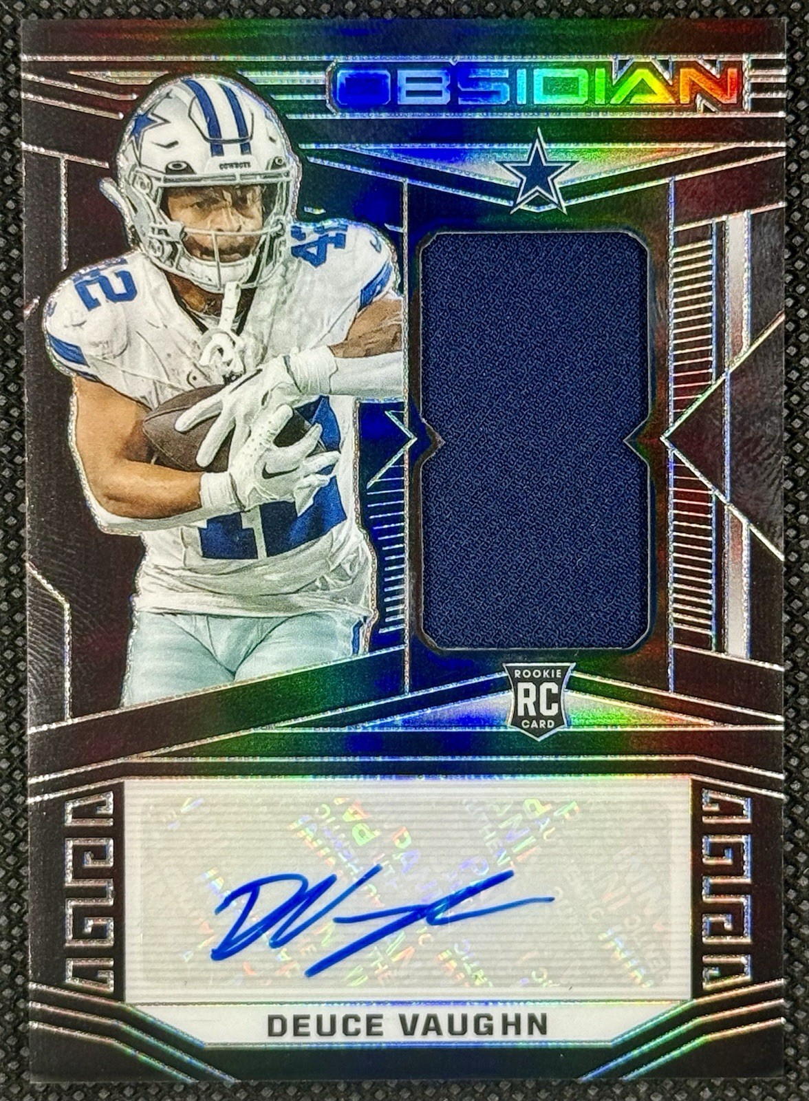 2023 Panini Obsidian Rookie Jersey RPA Auto #230 DEUCE VAUGHN #018/199 Cowboys
