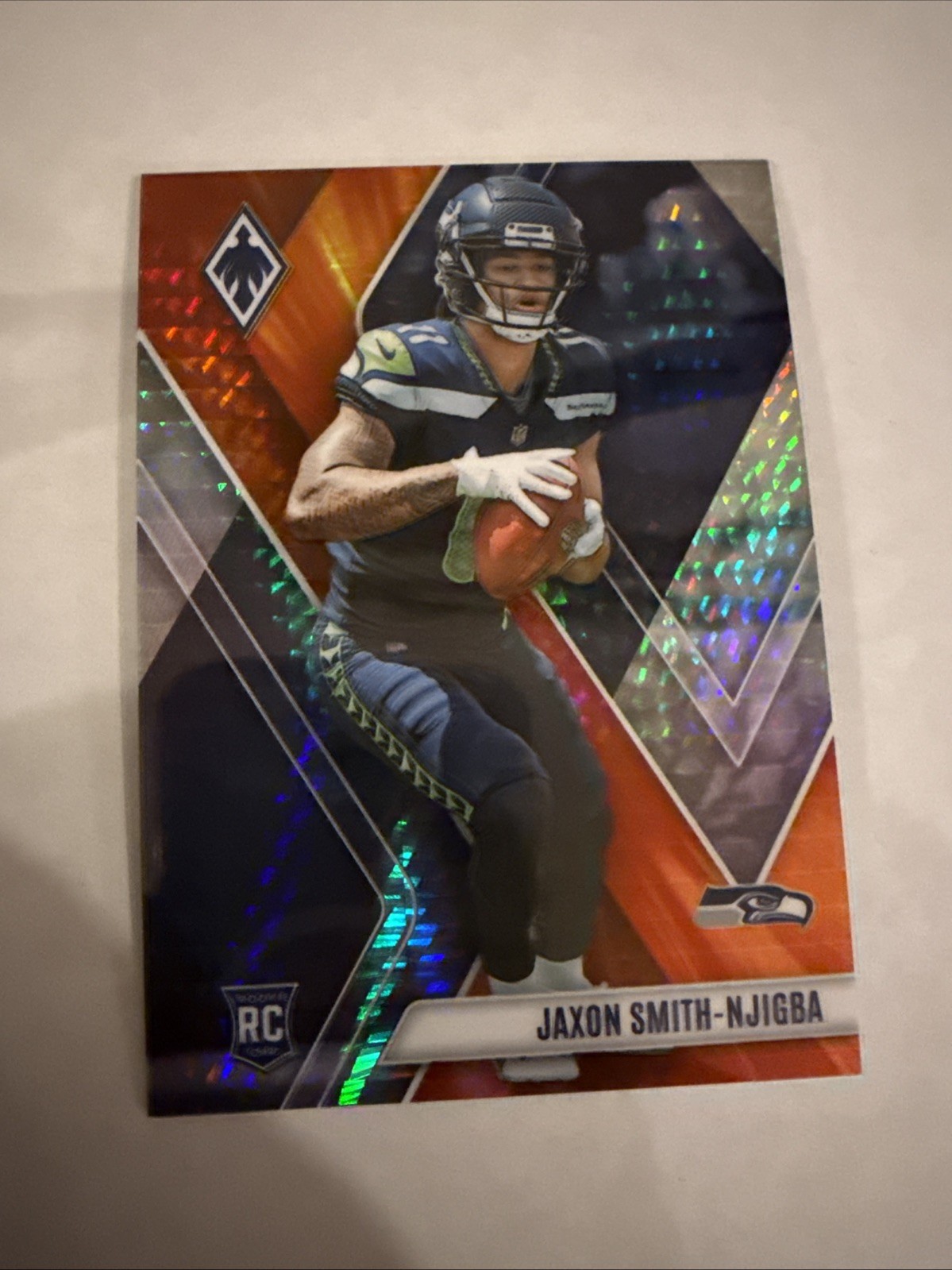 2023 Panini Phoenix - Rookies Jaxon Smith-Njigba #106 Fire Burst /340 (RC)