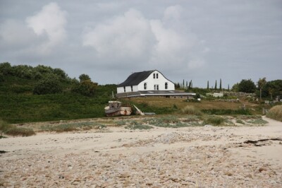 Photo 6x4 The Gugh farmhouse Hugh Town Obsolete fishing boat and one of t c2010