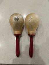 LATIN PERCUSSION MARACAS NATURAL RAWHIDE SHELLS w/ WOOD HANDLES