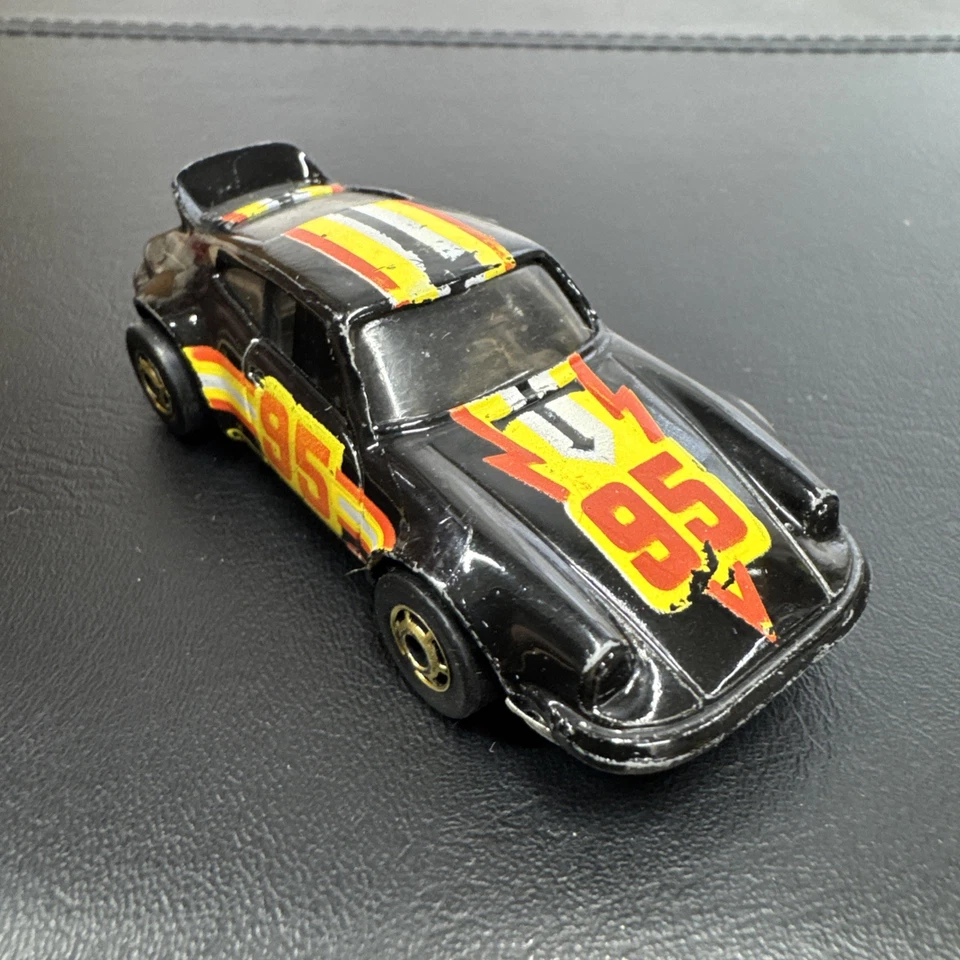 Coche de juguete diecast Hong Kong vintage años 70 Hot Wheels raro 1974 Porsche P-911 negro #95 Foto 2 de 4
