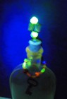 Vintage bottle w/ uranium and yooperlite accents & vintage clock key & UV light — photo 5