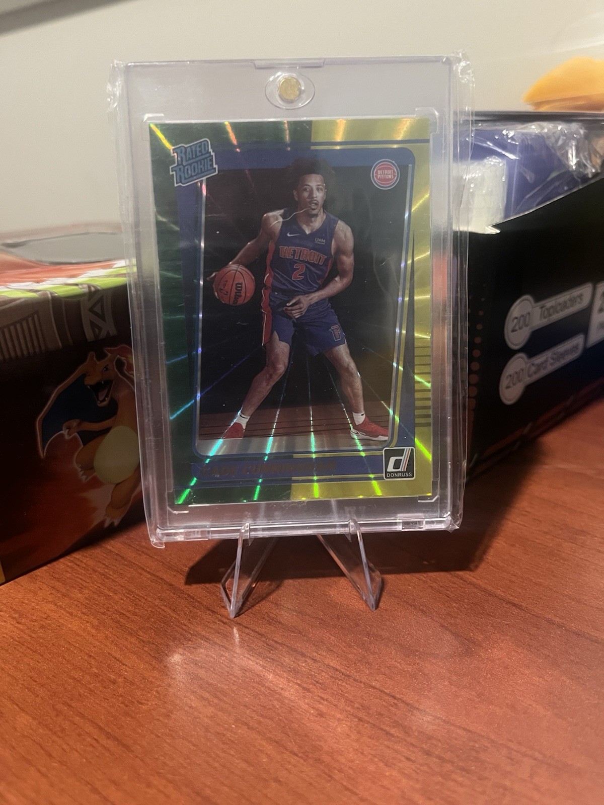 2021-22 Donruss #211 Cade Cunningham Holo Green and Yellow Laser Rated Rookie