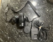 Pentax X70 SR Digital Camera- 12 MP - 24 x Optical Zoom - w Charger and Battery