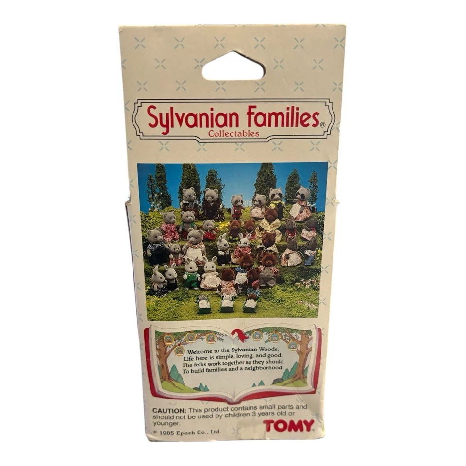 De Colección Tomy Sylvanian Families Caridad Castaño Bebé Mapache y Caja Manta Biberón Foto 2 de 4