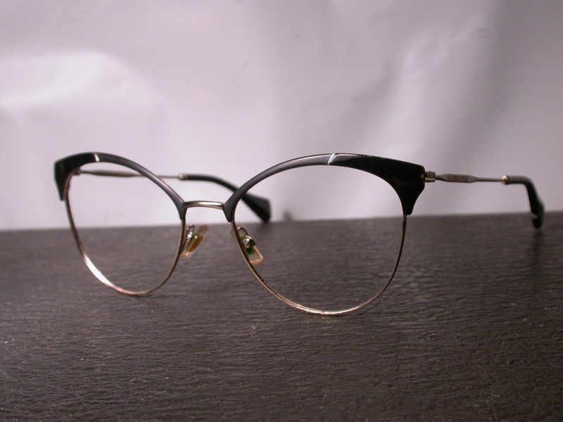 Miu Miu Black and Gold Metal Stylish Eyeglasses Frames Made in Italy