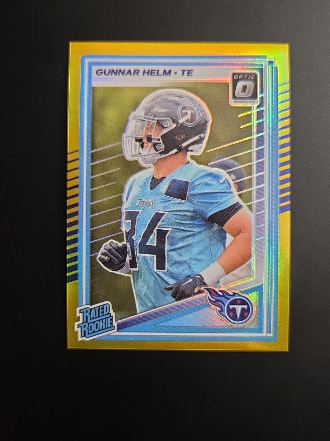 2025 Optic TRUE GOLD Gunnar Helm Rookie RC /10 #294 Titans 🔥
