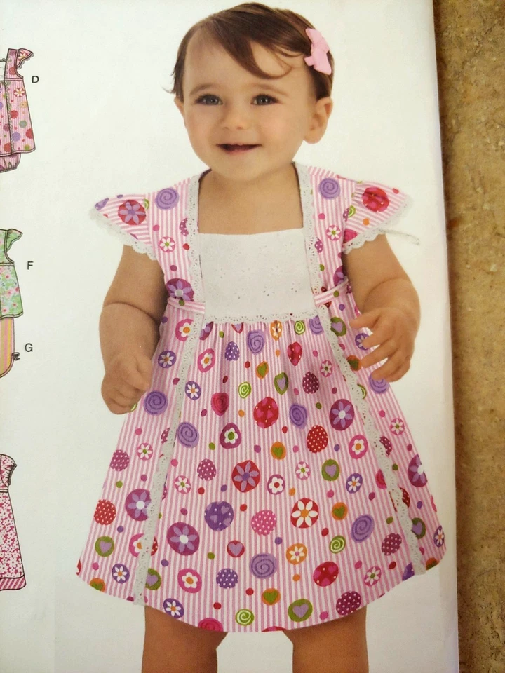 Simplicity 2985 Babies dress in two lengths, Top, Cropped Pants, Panties xxs-L - Image 2 of 4