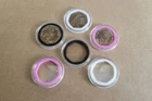 Coin capsules and inserts for 50p coins in circulation