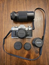 Canon AE-1 SLR 35mm Film Camera with Canon 50mm f/1.8 FD Lens W/Manual Tested