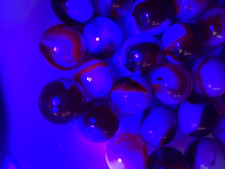 Lot of 34 Red White Swirl Marbles UV Reactive Cadmium Glass