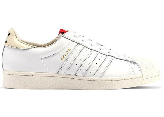 white and navy shell toe adidas