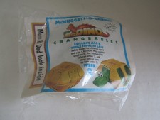 VINTAGE MCDONALDS MCDINO CHANGEABLES HAPPY MEAL TOY UNOPENED MCNUGGETS O SAURUS