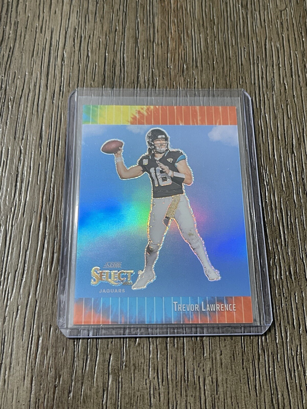 2023 Panini Select Trevor Lawrence Score Throwback Tie Dye Prizm 18/25 Jaguars