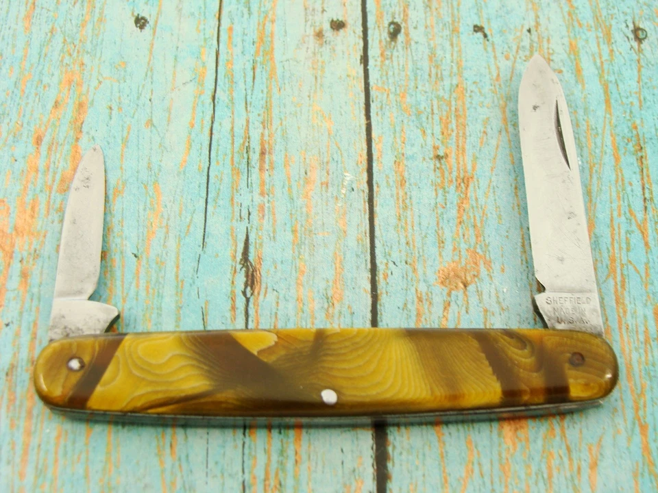 NAVAJA DE BOLSILLO VINTAGE SHEFFIELD CUTLERY EE. UU. CASCADA CELULOIDE EXTREMO IGUAL Foto 4 de 4
