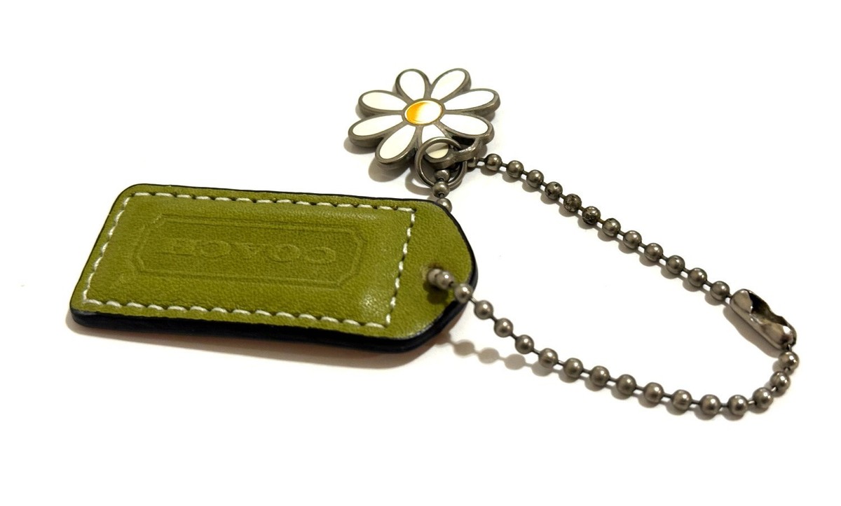 NICE VINTAGE COACH EMBOSSED GREEN LEATHER DAISY MOTIF BAG HANGTAG