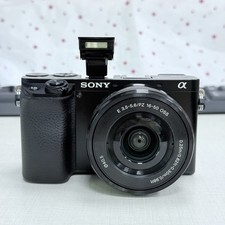 Sony Alpha a6100 24.2MP Mirrorless SLR Digital Camera W/ 16-50mm Lens English