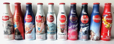 COCA COLA ALUMINIUM BOTTLES GERMANY 100 YEARS OF BOTTLES SET OF 10 UNOPENED FULL