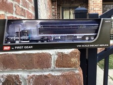 DCP 1:64 Peterbilt 379 63 Mid Roof Sleeper W 50 Wilson Tri Axle Grain trailer.