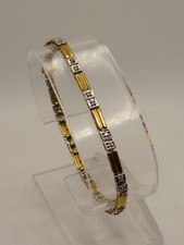 10K YELLOW  WHITE GOLD TENNIS BRACELET w 24 DIAMONDS - 7 " LONG 