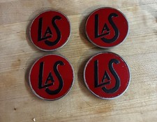 1937 Lasalle Hubcap And Bumper Medallions Returns Accepted.