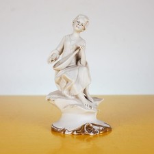 Statuetta Capodimonte di un musicista, firmata barbetta