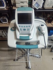 Verathon bvi 9400 bladder scanner with probe, a stand, a battery, and a bucket.