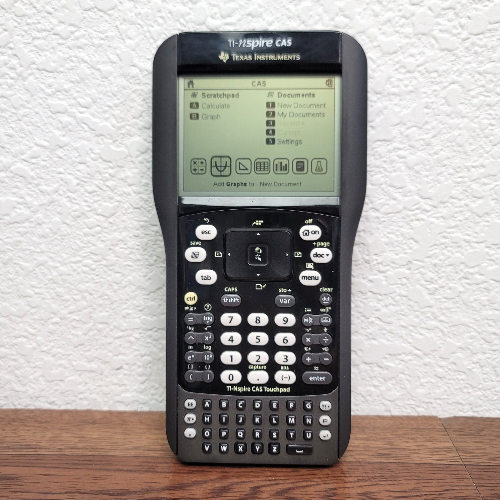Texas Instruments TI-Nspire CAS Graphing Calculator with Touchpad Cover and USB Cable