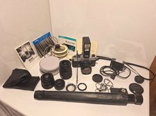 Konvolut von Kamera-Zubehör und Objektiven Yashica Spiegelreflexkamera