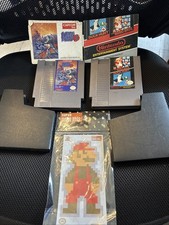 Super Mario Brothers and MegaMan 3 both with manuals + VINYL DECAL + TESTED !