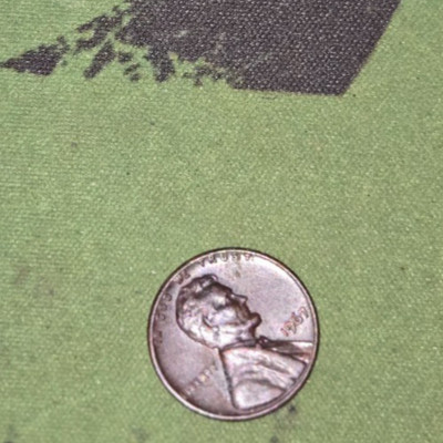 1967 no mint black Lincoln cent double edge with  double die