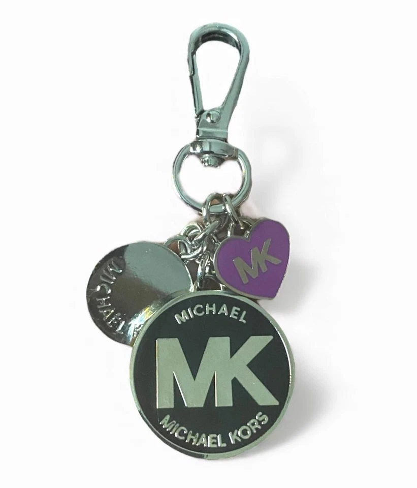 MICHAEL KORS - Dije Llavero Tono Plata Logo MK Bolso Circular Dije PÚRPURA Foto 3 de 3