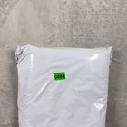 White vintage Russell Athletic Champs XL sweatpants with green zip tie label reading “0669” on front.