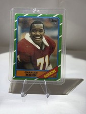 Topps 1986 Charles Mann Rookie #181 Washington Commanders D* Copyright Card. rookie card picture