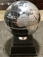 Things Remembered Solar Powered Globe Self Spinning With Black Base