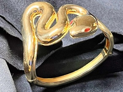 SNAKE BRACELET WITH RED PERIDOTES IN THE EYES IN 925 SILVER GOLD PLATED...