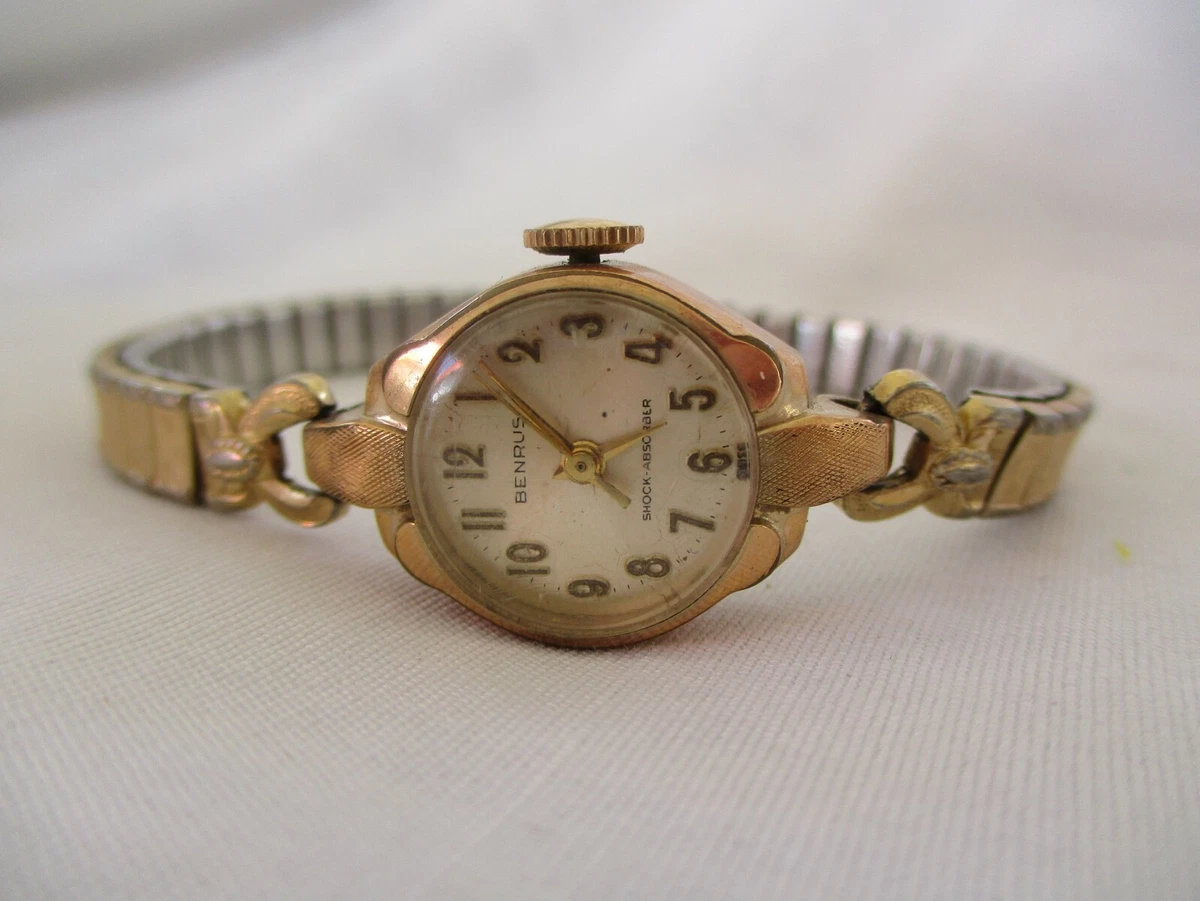 Montre bracelet Benrus 20 microns or electroplaque lunette a enroulement avec br