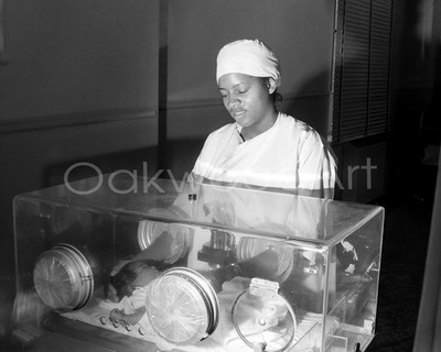 NURSE Caring for Newborn in Incubator c1960s, Black Woman, Vintage Photo Reprint