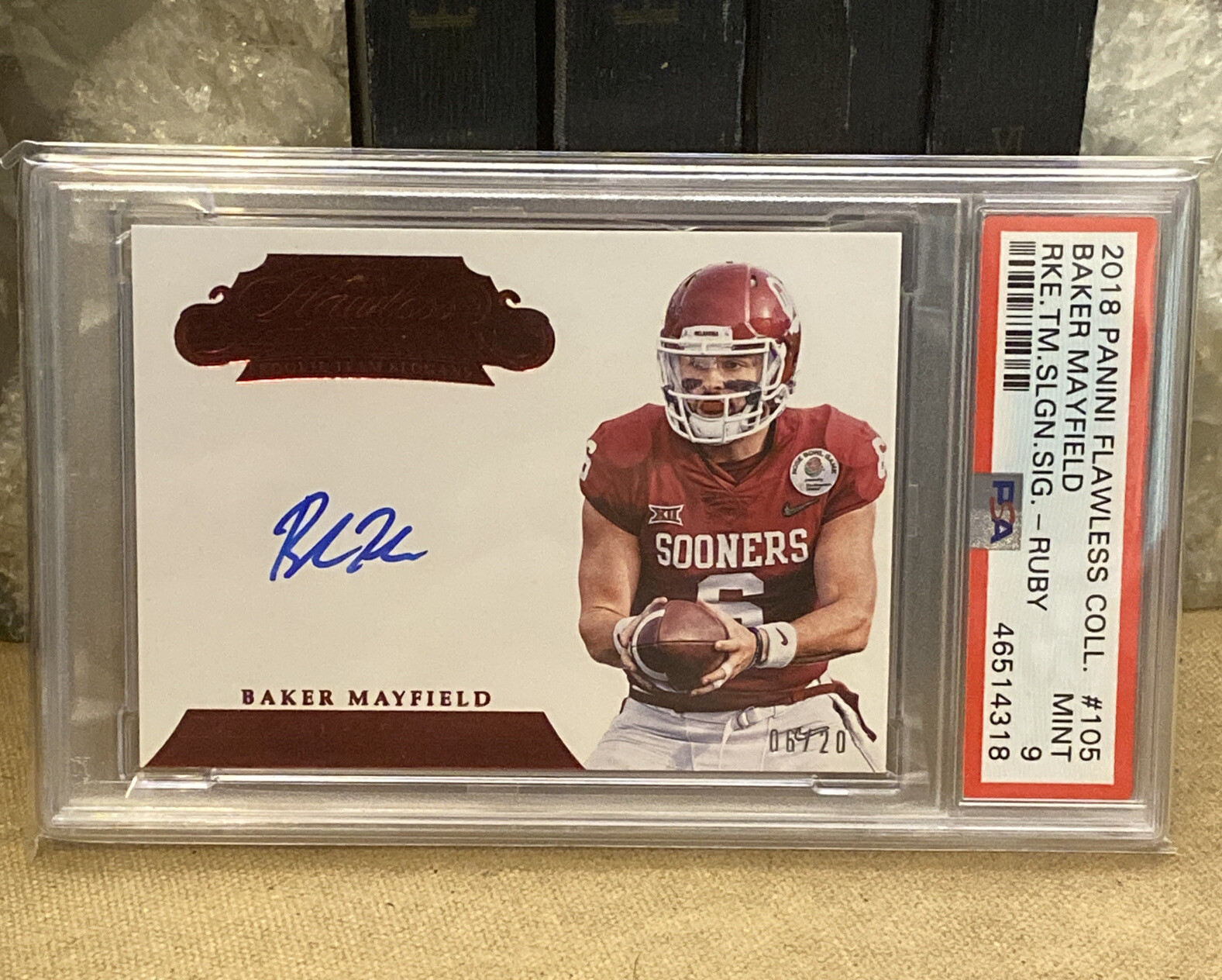 Baker Mayfield Panini Flawless Collegiate Rookie Team Slogan Signatures #105 Ruby