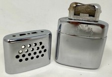 Vintage JON-E Chrome Hand Warmer Aladdin Mfg Co measures 3.5 x 2.4 x .8 in