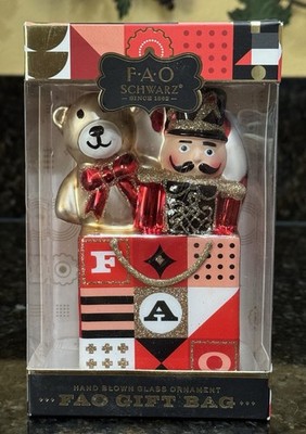 2018 FAO SCHWARTZ HAND BLOWN GLASS ORNAMENT Nutcracker & Teddy Bear