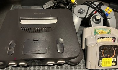 Nintendo 64 With A/V Cable, Expansion Pack Power Adapter, Controller And 3 Games