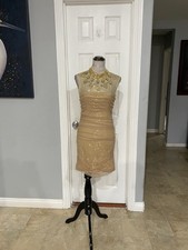 MODA Large Women gold ruched bodycon mini dress with embellished high neckline