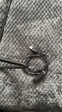 An IKEA small Black Lamp (warm light) HARTE LED, desk light, USB Port.